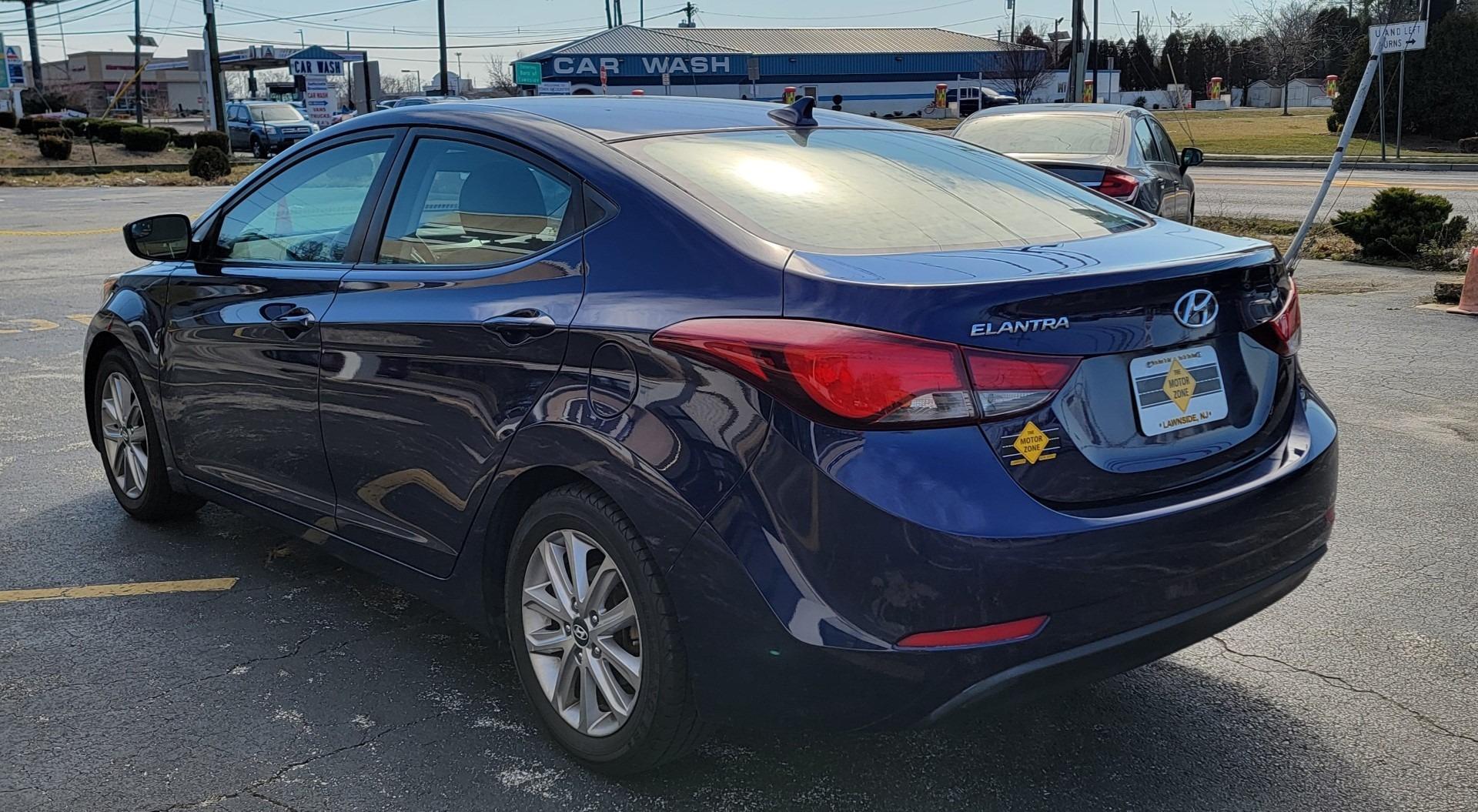 2014 Blue /Gray Hyundai Elantra Limited (5NPDH4AE2EH) with an 1.8L L4 DOHC 16V engine, 6-Speed Automatic transmission, located at 341 N White Horse Pike, Lawnside, NJ, 08045, (856) 262-9500, 39.855621, -75.027451 - Photo#3